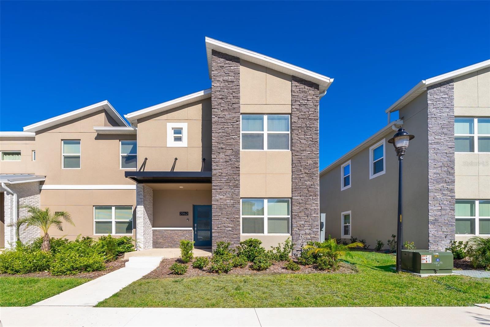 Welcome to this stunning fully furnished 5 Bedroom Townhome corner lot vacation/ Airbnb home located at well-known short term rental community Storey Lake Resort . INCREDIBLE OPPORTUNITY TO OWN A TOP PRODUCING INCOME PROPERTY in one of the best locations in Orlando! This well decorated home features 5 beds and 4 full baths, with tons of upgrades. quartz countertops, stainless steel appliances, and an open floor plan first floor that leads to a cozy private pool. The rooms are well decorated, with the owner having invested over $60k in upgrades., which definitely bring instant investment income. this vacation home promises not only a luxurious retreat but also a lucrative venture. Storey Lake features incredible amenities. Enjoy the Resort-style pool with a lazy river, waterslides, splash pad, beach volleyball, basketball court, and enclosed turf soccer field. There is an on-site restaurant/tiki bar located at the main pool. In addition to the original resort amenities area, a second area has just recently been completed and this is walking distance from the house. It's equipped with a zero-entry lazy river, pool, splash zone, restaurant, fitness center and playground. Also available for a minimal fee is a mini-golf course and kayak rentals. So many fun things to do here!! Storey Lake Resort is zoned for short term rentals and only 10 minutes away from Walt Disney World, 25 minutes from the Orlando International Airport, and 15 minutes from SeaWorld, Universal Studios and the Premium Outlets!