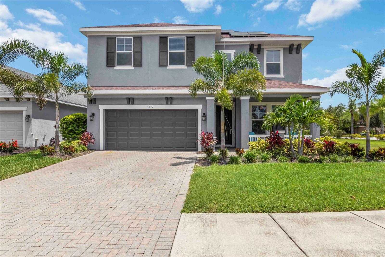 Welcome to your dream home in the desirable Palmer Reserve community! This beautifully maintained 4-bedroom + den, 3-bathroom home offers the perfect blend of space, comfort, and convenience—all just 2 miles east of I-75, providing easy access to everything Sarasota has to offer. Built in 2017, this newer construction home sits on an oversized corner lot, offering plenty of room for outdoor fun—or even the future pool of your dreams. With a thoughtfully designed layout, the home features a generous upstairs loft, ideal for a second living space, game room, or home theater. Step inside to find light oak wood-look tile flooring and large windows that fill the main living area with natural light, creating a bright and welcoming atmosphere. The open-concept kitchen and living room flow seamlessly to a spacious covered lanai through wide sliding doors, perfect for entertaining or simply soaking in the Florida lifestyle year-round. Home has an abundance of storage/closet space and fully paid for Solar system keeping monthly summer electric bills under $100! Located directly across from Tatum Ridge Elementary School, school drop-offs and pickups couldn’t be easier. The friendly Palmer Reserve neighborhood features just 90 single-family homes and includes its own playground for residents to enjoy. Walk or bike to the Celery Fields to bird watch or get your daily exercise in by running "the hill". With Downtown Sarasota, Lakewood Ranch's Waterside dining and shopping distrcit and the world-famous Siesta Key Beach just a 20-minute drive away, this home truly has it all—modern living, convenience, and community.