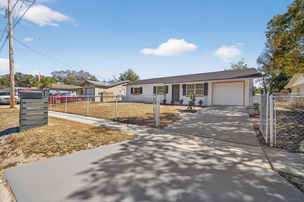 Photo of 8309 Tupelo Drive, Tampa, FL 33637 (MLS # TB8472193)