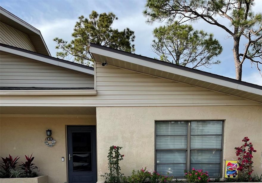 Immediate Invest Income. Rare opportunity to own a 1st floor 2B/2B END UNIT in a maintenance free community. NO AGE RESTRICTIONS. 6 miles to gulf beaches! Upgrades include: remodeled bathrooms, LVP flooring, paint, ceiling fixtures & SS appliances. Condo is NOT IN A FLOOD ZONE. Amazing tenants in place until June, 2026.