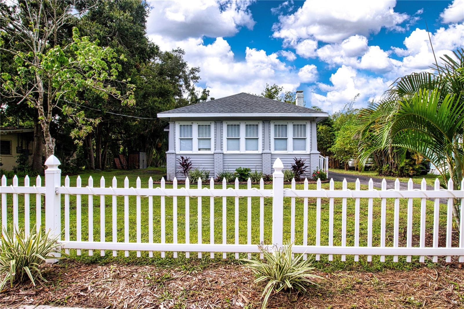 What a great opportunity to own a charming home in the Historic District of Palmetto. This neighborhood is know for its Old Florida charm and community feel where you can walk to the Manatee River Marina area for sunsets, ice cream or dinner at the Riverhouse Restaurant. Also in walking distance is the library and beautiful Sutton Park. This home was updated in 2021 with beautiful granite countertops, new cabinets and appliances, new flooring and also a new roof. The yard is spacious with room for all your toys. The location can't be beat with easy access to Sarasota, Bradenton, St. Pete and Tampa where you will find lots of activities. Emerson Points is nearby, a 365 acre preserve where you can kayak and canoe or bike on the great trails. Don't forget our beautiful Gulf beaches are just a short drive away! This property was unaffected by recent storms. No deed restrictions.