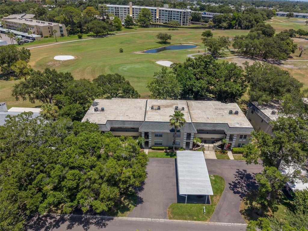 Photo of 73 Country Club Drive, Largo, FL 33771 (MLS # TB8561120)