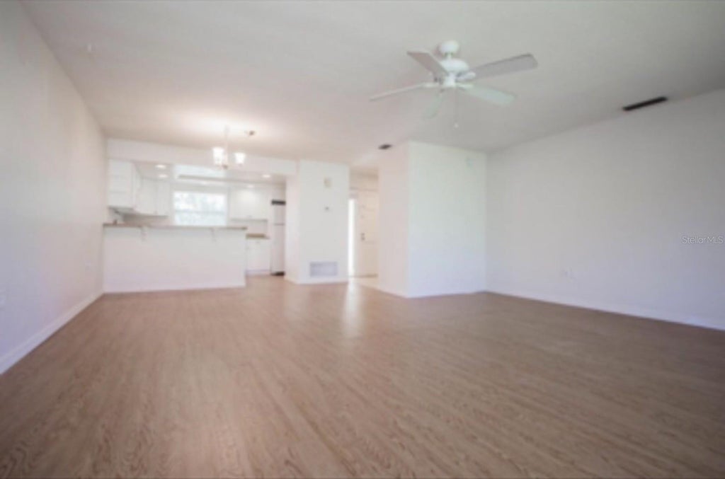Photo of 73 Country Club Drive, Largo, FL 33771 (MLS # TB8561120)