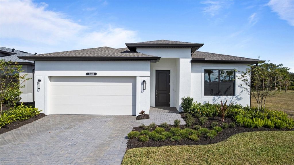 Photo of 5028 Lowland Terrace, Parrish, FL 34219 (MLS # W7883235)