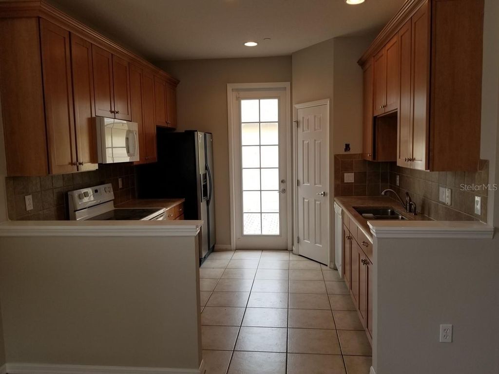 Photo of 9101 Camden Gardens Street, Orlando, FL 32827 (MLS # O6409828)