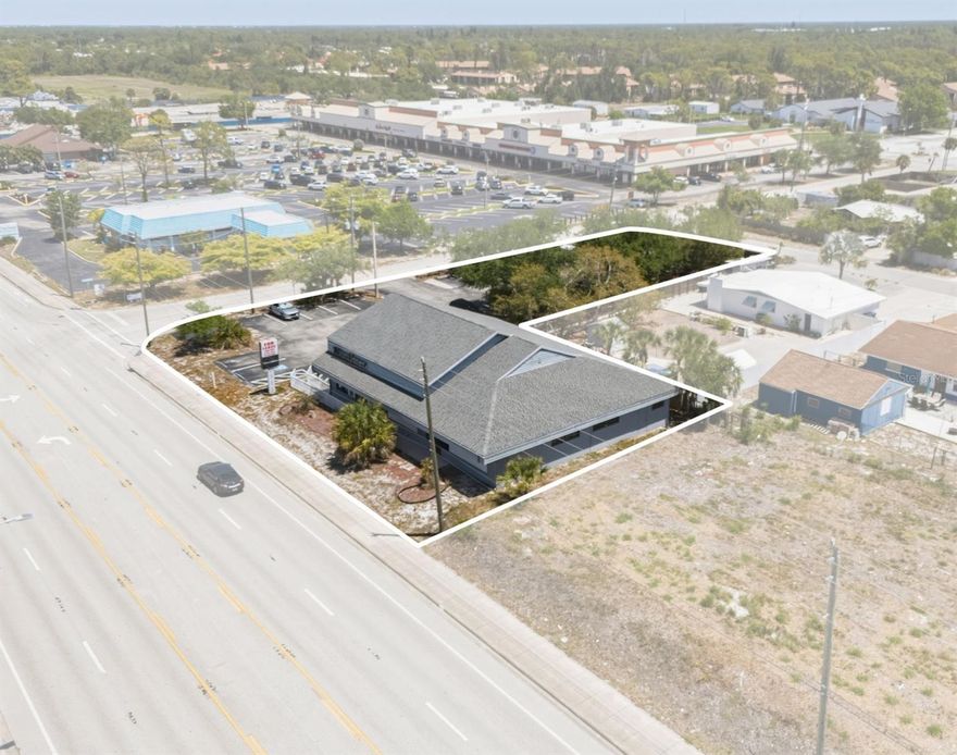 EXCEPTIONAL INCOME-PRODUCING COMMERCIAL OPPORTUNITY IN ENGLEWOOD
Positioned on a prominent corner lot with outstanding visibility, this well-maintained commercial property offers a rare investment opportunity in a high-growth corridor of Englewood. With over 4,800 total square feet, the property consists of three office units zoned OPI (Office, Professional, Institutional), making it ideal for a variety of professional and business uses. The oversized parcel provides ample parking with 31 spaces, including two ADA-compliant spots, ensuring convenience for tenants and clients alike.
**Suite A: (approx. 1,700 SF) is currently leased to a long-term tenant, providing immediate, stable income. This suite features a spacious reception area with front desk, four private offices (including a conference room), an equipment room, break room, and two restrooms.
**Suite B: (approx. 600 SF) offers a flexible layout, including a 11’ x 28’ front office, 8’ x 12’ back room, 8’ x 10’ office/mailroom, and a 9’ x 12’ kitchen area.
**Suite C: (approx. 1,900 SF) is a larger suite featuring a welcoming reception area with a sliding window to the administrative office, conference room, storage and copier rooms, an open workspace with three cubicles, two additional private offices, and two restrooms. Units B and C were most recently leased together, offering versatility for single or multiple tenants.
Located along a high-traffic corridor with excellent accessibility from both north and southbound routes, the property benefits from strong surrounding residential density and nearby commercial activity—supporting long-term tenant demand and investment growth.
Don't miss this opportunity! Schedule your private showing today!