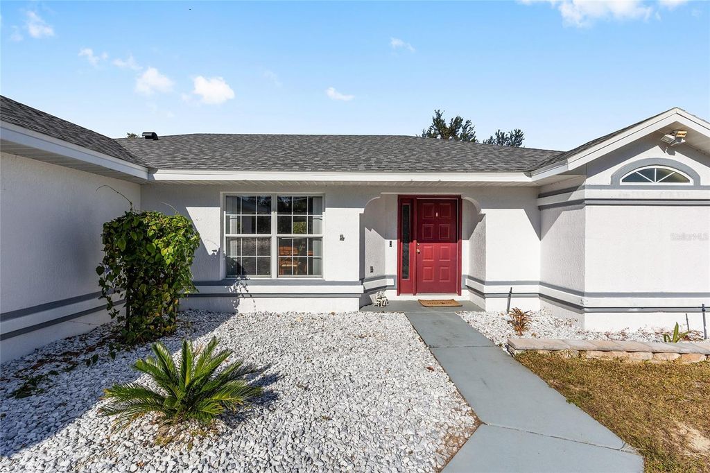 Photo of 2219 SW 146th Loop, Ocala, FL 34473 (MLS # OM714541)