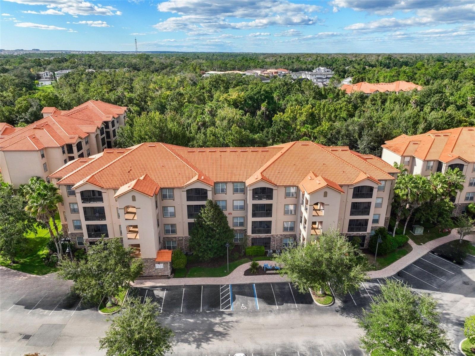 Discover your dream lifestyle in this meticulously maintained, fully furnished 2-bedroom, 2-bathroom condominium, ideally situated in Building 7 of the Tuscana Resort at ChampionsGate, a sought-after gated community. This stunning unit boasts a bright, open floor plan, showcasing tranquil wooded views from your private, second-floor balcony.
No detail has been overlooked in this move-in ready retreat! Enjoy the peace of mind that comes with knowing all kitchen appliances, furnishings, and paint were replaced/refreshed last year, ensuring a pristine and contemporary environment for its new owners.
The spacious primary bedroom offers a private sanctuary, featuring a luxurious en suite bathroom and an expansive walk-in closet. The second bedroom is conveniently located away from the primary bedroom, offering privacy and flexibility for guests or family members.
Beyond the unit, the Mediterranean-style Tuscana Resort provides an array of superb amenities for residents to enjoy. Take a dip in the sparkling community pool, unwind in the fitness center, catch a movie in the on-site theater, or watch the kids play at the playground.
Location is paramount, and this condominium delivers! Located in the vibrant center of ChampionsGate, you'll be just 15 minutes away from Walt Disney and Central Florida's other world-famous theme park attractions, renowned restaurants, championship golf courses, and premier shopping centers. This property is zoned for short-term rental, making it an ideal investment opportunity or a perfect vacation home for personal enjoyment. It can also serve as a luxurious permanent residence.
Don't miss this exceptional opportunity to own a piece of paradise in one of Central Florida's most desirable communities! Schedule your private showing today and experience the Tuscana Resort difference.