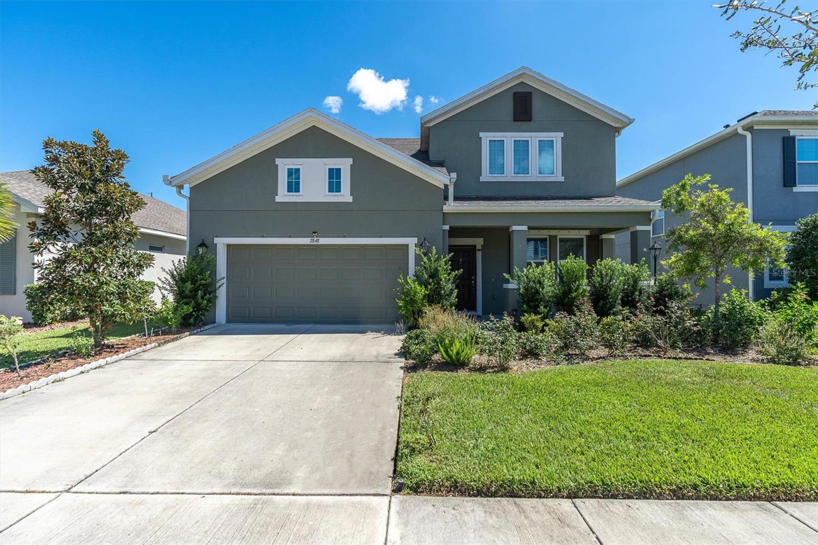 This beautiful home by Ashton Woods includes 3 bedrooms, 2.5 baths (2,329 sq ft living space) plus den which allows you to create your own work from home space. Step inside and prepare to fall head over heels for the beautiful white kitchen cabinets, exuding both elegance and functionality. The mesmerizing river white granite countertops will surely leave you in awe, adding a touch of sophistication to your culinary adventures. On the first floor, you will find pristine wood floors, creating a warm and inviting atmosphere. As you venture upstairs, plush carpets await in the second-floor bedrooms, providing comfort and coziness. All three bedrooms are located upstairs along with a spacious loft space. The Primary bedroom offers an oversized closet and a beautiful ensuite with rain shower head. The back yard offers a full lanai and a huge yard space that is a fantastic for the little ones! Asturia has a gorgeous resort style clubhouse with pool, fitness center, walking trails, playgrounds, and more! Schedule your private showing today!
