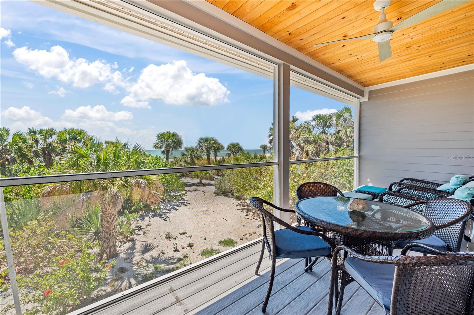 A luxury beach-front condo doesn't get better than this! Welcome to North Captiva Island, your private oasis offering a magical island lifestyle with clear turquoise waters, beautiful natural wild life, and gorgeous sandy beaches! North Captiva Island is a private island accessible only through private aircraft with access to the island's air strip, or you can access via ferry or private boat. Please contact the listing agent if you're interested in purchasing a private boat slip located at the first spot on the Island Water Club marina. The condo has been completely renovated and updated with new appliances and furniture which convey with the sale. For your convenience, there are are two suites, both of which are spacious, bright, and the bathrooms are beautifully outfitted with tile, solid countertops in the bathrooms, and the home boasts waterproof luxury vinyl plank throughout. The kitchen is made out of solid wood in white shaker style, the island sets a gorgeous tone with Calacatta Quartz, and the views of the ocean are mesmerizing! The island is also home to the Clubhouse which features restaurants, bars, pool, retail shops, and membership in the HOA grants the owner discounted rates for these amenities as well as the ferry. Whether you want to rent this property as an Air BnB or occupy it as your vacation home, this gorgeous condo has been meticulously remodeled to impress even the most selective buyers!