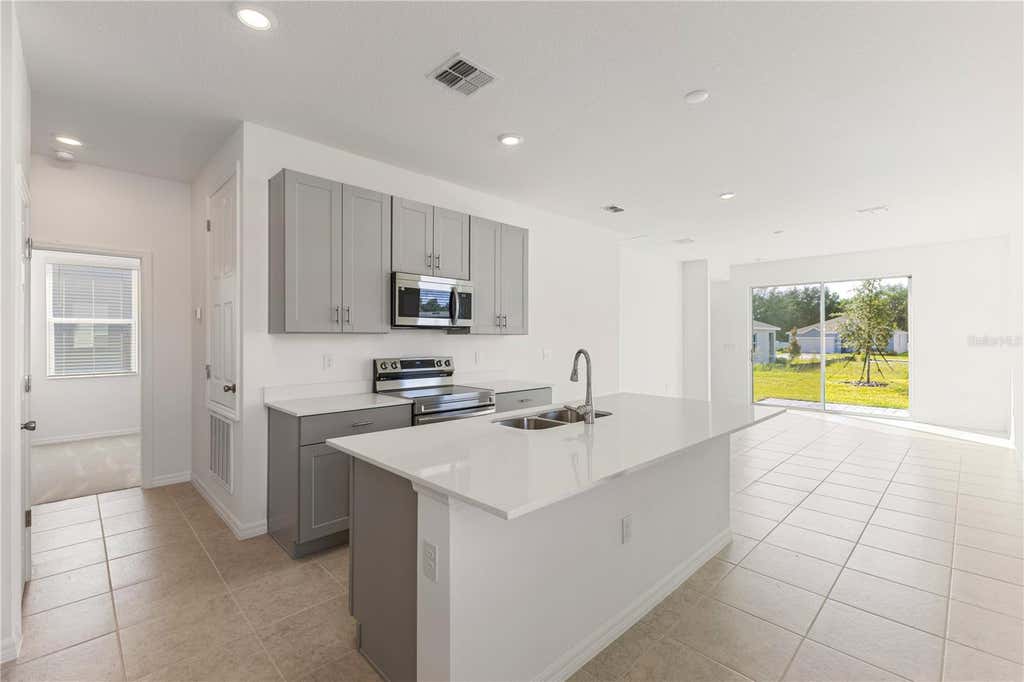 Photo of 9116 Wildlight Trail, Wildwood, FL 34785 (MLS # O6415991)