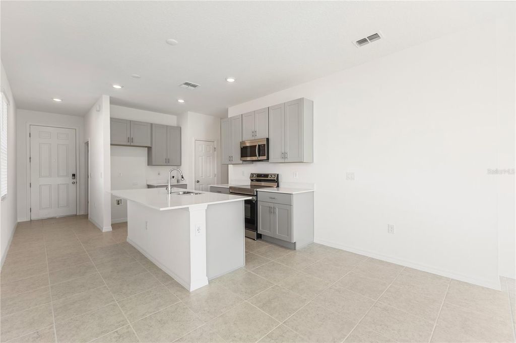 Photo of 9116 Wildlight Trail, Wildwood, FL 34785 (MLS # O6415991)