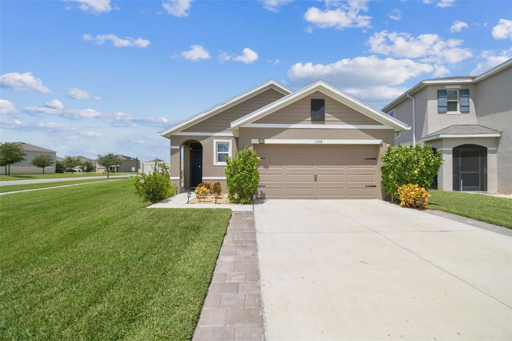 Photo of 1398 Crescent Hoop Way, Wesley Chapel, FL 33543 (MLS # TB8419339)