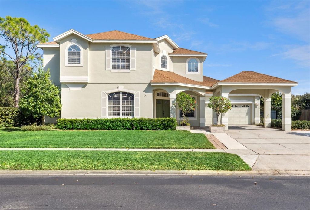 Photo of 12002 Shadowbrook Lane, Orlando, FL 32828 (MLS # O6375010)