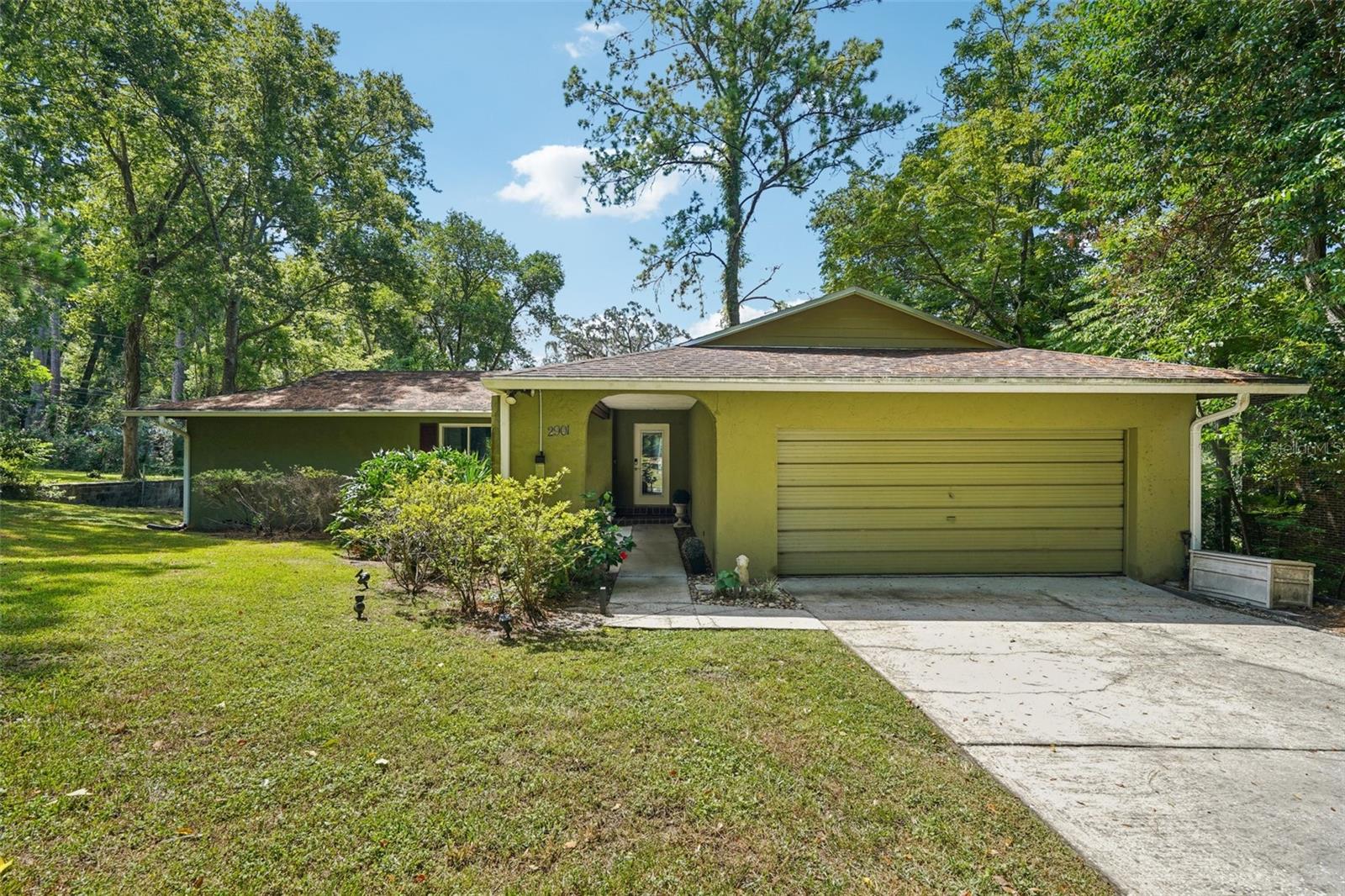 Welcome to this rare find in the highly sought-after Black Acres neighborhood of Gainesville. This 3-bedroom, 2-bathroom home offers 1,726 sq ft of living space, plus a full-sized basement—an uncommon feature in Florida homes. The basement is not included in the square footage and offers incredible potential for storage, a hobby space, or even a rental opportunity. Inside, the home boasts two spacious living rooms, providing flexibility for entertaining, relaxing, or setting up a home office. The kitchen is outfitted with stainless steel appliances, generous counter space, and plenty of cabinetry to meet all your cooking and storage needs. The primary bedroom includes an en suite bath with a tub and shower combo for convenience and comfort. Step outside to enjoy the screened-in lanai, the perfect spot to unwind while overlooking the large backyard. Sitting on over a quarter of an acre, the property offers plenty of outdoor space for gatherings, gardening, or simply soaking up the Florida sunshine. Location is everything, and this home delivers. Just a mile from the University of Florida, Ben Hill Griffin Stadium, shopping, dining, and everyday conveniences, you’ll love the accessibility of this central spot. With its unique design, versatile basement, and oversized lot, this home presents a one-of-a-kind opportunity in Gainesville.