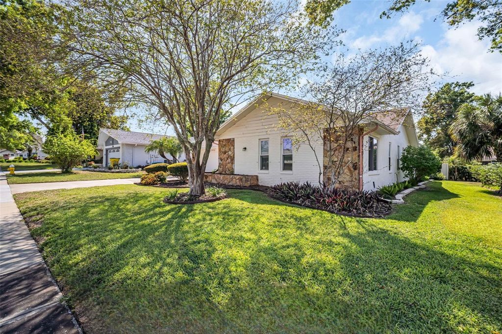 Photo of 2938 Macalpin Drive W, Palm Harbor, FL 34684 (MLS # TB8491531)