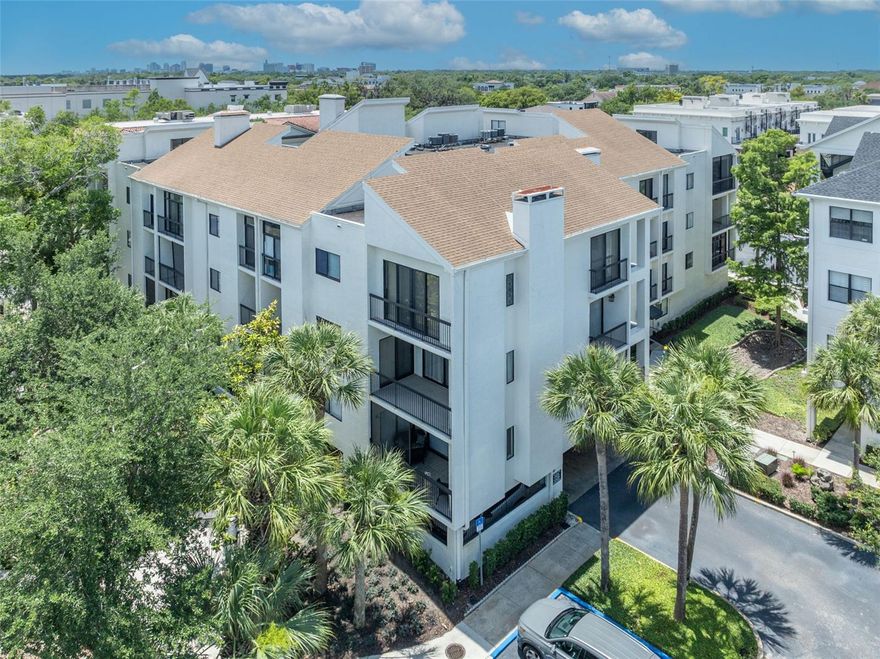One or more photo(s) has been virtually staged. Welcome to Park West Condominiums — one of Winter Park’s most coveted and rarely available condominium communities, ideally located just one block from the boutiques, dining, and charm of Park Avenue. This unique 4th floor residence offers an exceptional combination of space, privacy, and potential. Featuring 3 bedrooms and 2 bathrooms, the expansive floor plan has been enlarged by enclosing two patios, creating generous living spaces rarely found in condominium living. Vaulted ceilings, skylights, and abundant natural light enhance the open, airy feel throughout the home, while the top-floor location provides remarkable tranquility and privacy. The spacious kitchen offers ample counter space, a breakfast bar, and excellent cabinet space, while the living area is anchored by a fireplace — another uncommon feature in condo living. Large bedrooms, a sizable in-unit laundry room with extensive storage, and an oversized attic provide an extraordinary amount of storage seldom seen in comparable properties. The primary suite features vaulted ceilings, a walk-in closet, and a spacious bathroom layout. For maximum flexibility, the second bedroom, featuring a bright Sun Room alcove, connects to the primary bedroom so it could also be utilized as a private den. Recent unit improvements include a NEW HVAC system, a NEW Water Heater, and Plumbing updates. A reserved covered parking space is included, along with plentiful guest parking for visitors. Residents of Park West enjoy a secure gated entrance, community pool, tennis court, on-site community manager, and beautifully maintained grounds with extensive recent community improvements completed. Association fees include water, sewer, and trash service, creating a truly low-maintenance “lock-and-leave” lifestyle ideal for travelers or seasonal residents. While this condo presents an exciting opportunity for personalization, the location, floor plan, and features make this an exceptional offering with tremendous potential. Opportunities in Park West are exceedingly rare — this is your chance to create something truly special in the heart of Winter Park.