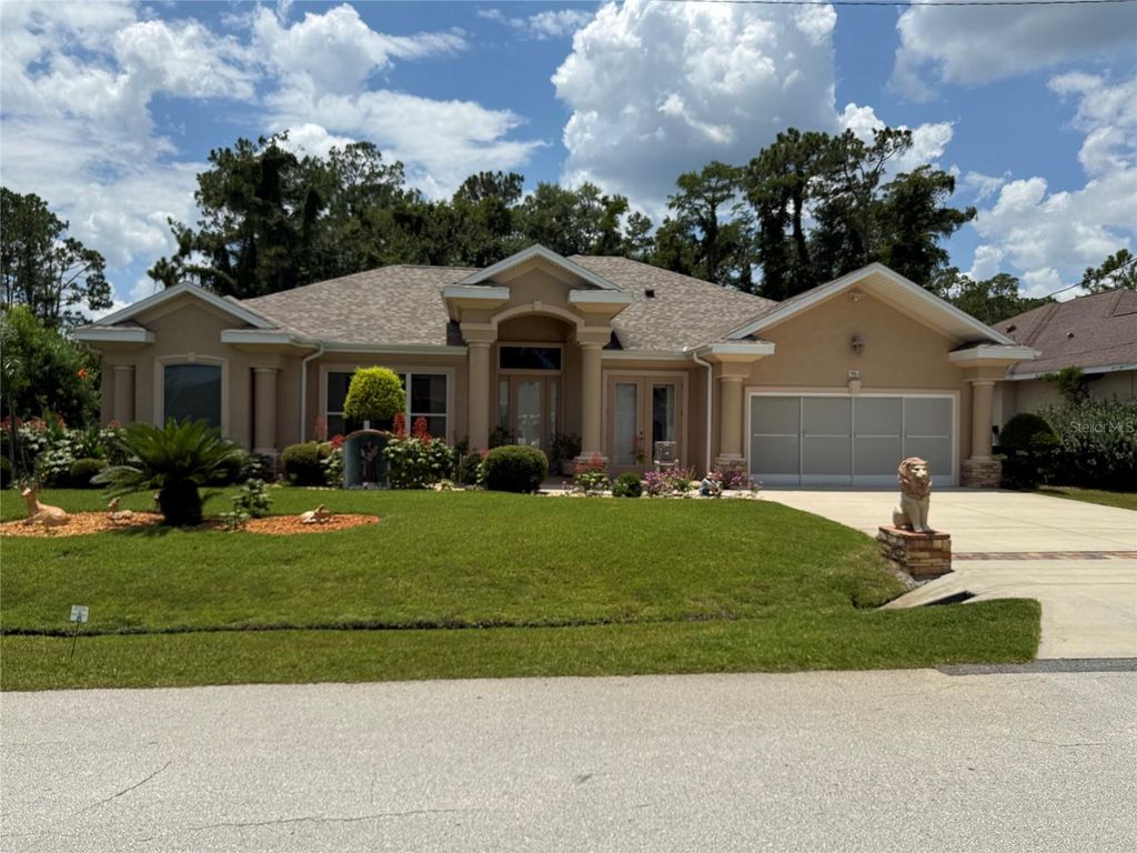 Photo of 96 Esperanto Drive, Palm Coast, FL 32164 (MLS # FC320047)