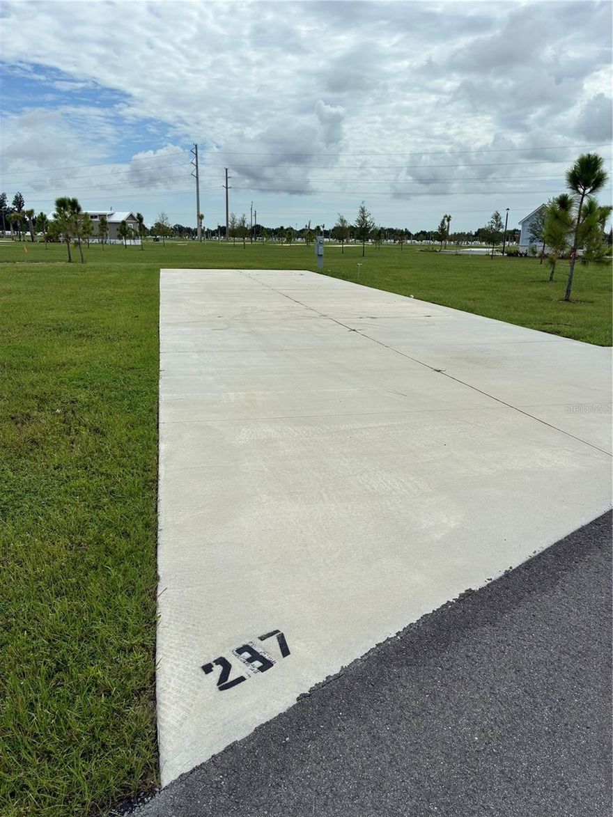 Located in the welcoming Palm Breeze RV Resort, this vacant lot at 237 Horizon Road in Punta Gorda, FL 33980 offers a rare opportunity to place your RV, park model, or manufactured home in a well-maintained, pet-friendly community with no age restrictions. The lot is cleared, level, and full hook-up ready with electric, water, sewer, and cable connections available, and includes a concrete pad (buyer to verify). Residents enjoy resort-style amenities including a heated pool, clubhouse, shuffleboard courts, community events, laundry facilities, and on-site management—all for a low HOA fee of just $375 a month. With no land lease (you own the lot), this is an ideal option for affordable seasonal or year-round living. Conveniently located near downtown Punta Gorda, shopping, dining, medical facilities, marinas, and I-75, this lot is perfectly positioned to enjoy the best of Southwest Florida. If not using the lot, feel free to place it in the rental program here at Palm Breeze.