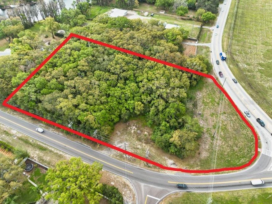 2.91 acres of prime vacant land in the highly desirable Odessa area, positioned at the signalized intersection of Gunn Highway and Lutz Lake Fern Road—an established high-traffic corridor with excellent visibility and accessibility. The property is zoned PD and already approved for the development of three buildings totaling approximately 18,500 square feet, allowing for business services, professional services, and health practitioner offices. This flexible zoning and pre-approved development plan present an outstanding opportunity for investors, developers, or end users looking to establish a professional office complex in a thriving area. Surrounded by established residential communities and steady daily traffic, the site offers strong exposure and convenient access for clients and employees alike. Located within one of the region’s most desirable and affluent zip codes, the area is known for its high household income levels and continued growth—making it an ideal location for medical, professional, and service-oriented businesses. With nearly three acres of developable land, a prime corner location, and approvals already in place, this property is ready for the next phase of development in one of Odessa’s most sought-after commercial corridors.