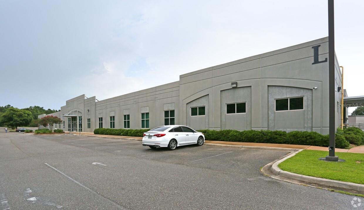 5% Cap Rate! Imagine securing a long-term lease with one of the strongest tenants in the country — State of Florida! The State guarantees you unmatched stability and reliability with its notable AAA investment rating. This isn't just a lease; it’s a partnership with a financially robust institution known for its commitment to fiscal responsibility. Don’t miss this opportunity to invest in a partnership that promises security and growth—let Florida State be your trusted tenant!
All required improvements for the tenant have been completed. The HVAC system was replaced in 2021, and the membrane roofing has been redone. New awnings, a loading dock lift, bathrooms, and flooring have also been installed. These upgrades ensure that the property effectively meets the tenant's needs.