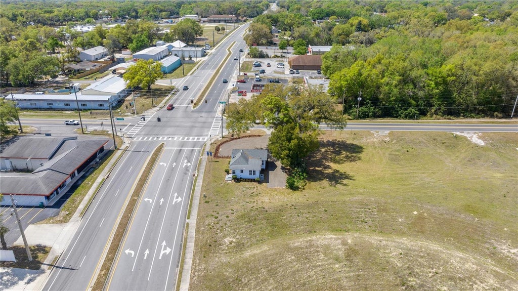 Photo of 401 N Dixie Avenue, Fruitland Park, FL 34731 (MLS # OM732661)