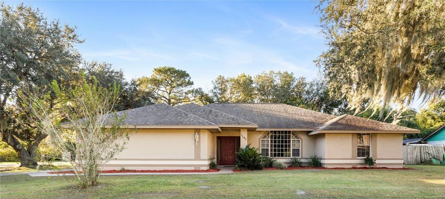 This delightful three bedroom, two bathroom, two car side-entry garage home is located on a corner lot. With over 1900 sq ft of living space which includes a formal dining room, a large living room, a family room, a modern kitchen with a large bar, and a pass through window to the extra large screened in patio. This split plan home has large walk-in closets, high ceilings, ceiling fans, and tile throughout the home. About one mile from Mariners Cove Park boat ramp. Walking distance from Green Springs Park and bike trails. This home is move in ready. The listing agent is the owner. Contact her today.