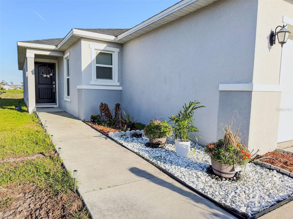 Photo of 334 Preserve Pointe Boulevard, Davenport, FL 33837 (MLS # S5148111)