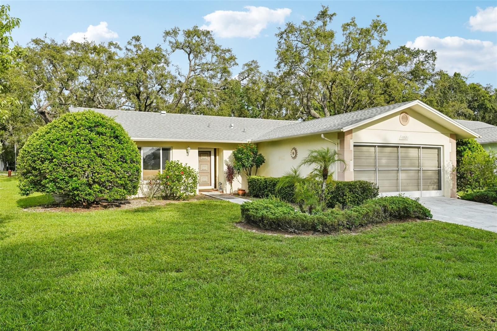 Welcome to Timber Oaks, a vibrant 55+ community offering peace, comfort, and an active lifestyle.
This move-in-ready 2BR/2BA concrete block home features a NEW roof, A/C, and windows all 2022.
Perched on an elevated lot with a 2-car garage, enjoy added savings with an irrigation well and rust inhibitor system. Inside, the updated kitchen offers granite countertops, modern backsplash, and two pantries. The indoor laundry room adds storage, and a screened garage door lets in the breeze. Relax in your enclosed Florida room, ideal for hobbies or guests.
Low HOA fees include access to the lakeside clubhouse with heated pool, spa, pickleball, tennis, shuffleboard, bocce, billiards, and a full calendar of events.
Furnishings currently in the home may be available under separate agreement if buyers are interested. A perfect Florida retreat awaits.