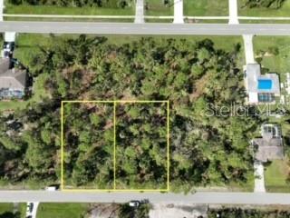 "Just a few minutes from shopping, 30 minutes from the beach, and plenty of playgrounds nearby. This double lot is perfect for building a future dream home in beautiful southwest Florida. Nestled in a lovely neighborhood near new construction homes. This is a great place to raise a family or invest for the future. Take advantage of your own little slice of living the dream!"