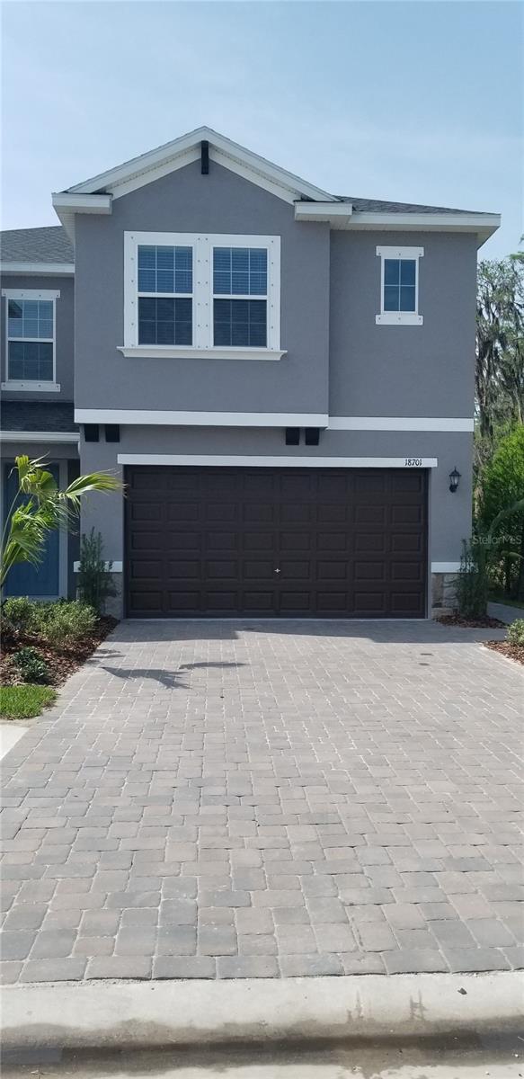 3/2.5/2 Townhome located in Gated community of Sylvan Crossing. Welcome home to this open concept living space downstairs. Kitchen features granite counters, Stainless Appliances, Huge center island with eating area for up to 6, 42" wood cabinets, A closet pantry with additional Butler's pantry area as well. Half bath downstairs. Upstairs you will find a huge loft / flex area which could be used as an office, Theater room, Play area etc. The upstairs also has a split bedroom plan with views of the pond and conservation area. The laundry room is conveniently located upstairs as well and includes a washer & dryer. Primary bedroom features huge walk-in closet, and the primary bath boasts dual sinks, granite counter, step in shower and separate water closet. Community offers a resort style pool, Cabana, BBQ area, walking trail and more. Located in the very desirable Steinbrenner school district. This property is conveniently located to Veterans pkwy making commuting to Tampa airport, Westshore and downtown areas a breeze.