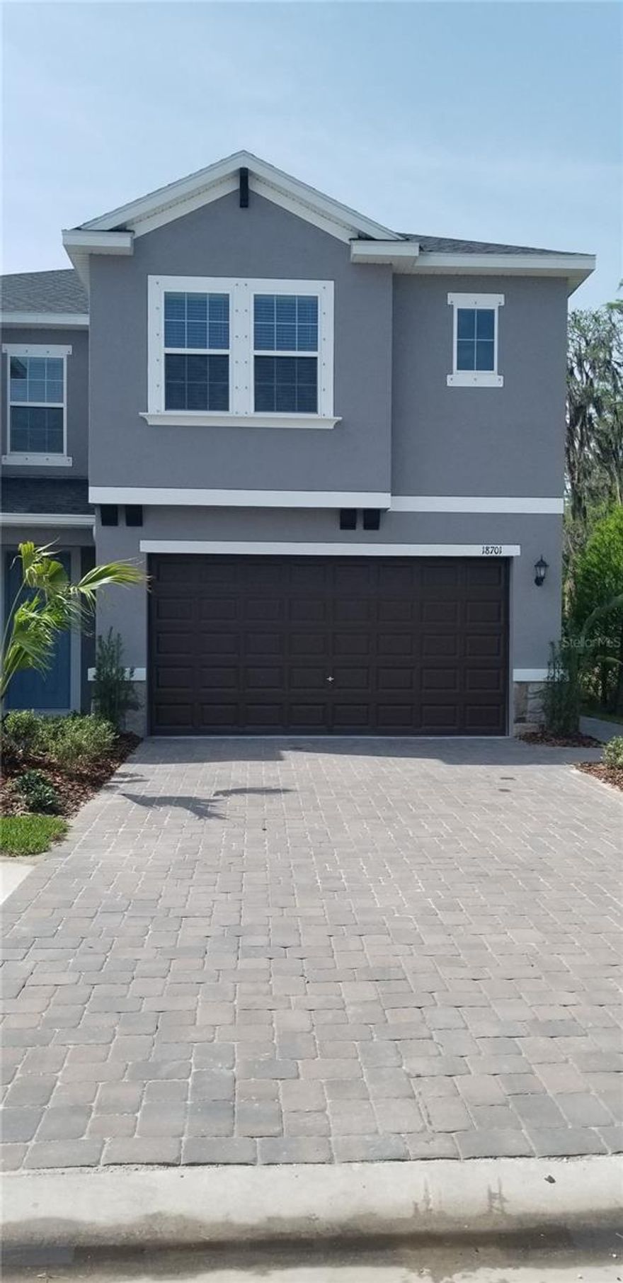 3/2.5/2 Townhome located in Gated community of Sylvan Crossing. Welcome home to this open concept living space downstairs. Kitchen features granite counters, Stainless Appliances, Huge center island with eating area for up to 6, 42" wood cabinets, A closet pantry with additional Butler's pantry area as well. Half bath downstairs. Upstairs you will find a huge loft / flex area which could be used as an office, Theater room, Play area etc. The upstairs also has a split bedroom plan with views of the pond and conservation area. The laundry room is conveniently located upstairs as well and includes a washer & dryer. Primary bedroom features huge walk-in closet, and the primary bath boasts dual sinks, granite counter, step in shower and separate water closet. Community offers a resort style pool, Cabana, BBQ area, walking trail and more. Located in the very desirable Steinbrenner school district. This property is conveniently located to Veterans pkwy making commuting to Tampa airport, Westshore and downtown areas a breeze.