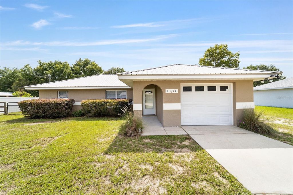 Photo of 11570 SE 84th Avenue, Belleview, FL 34420 (MLS # OM727021)