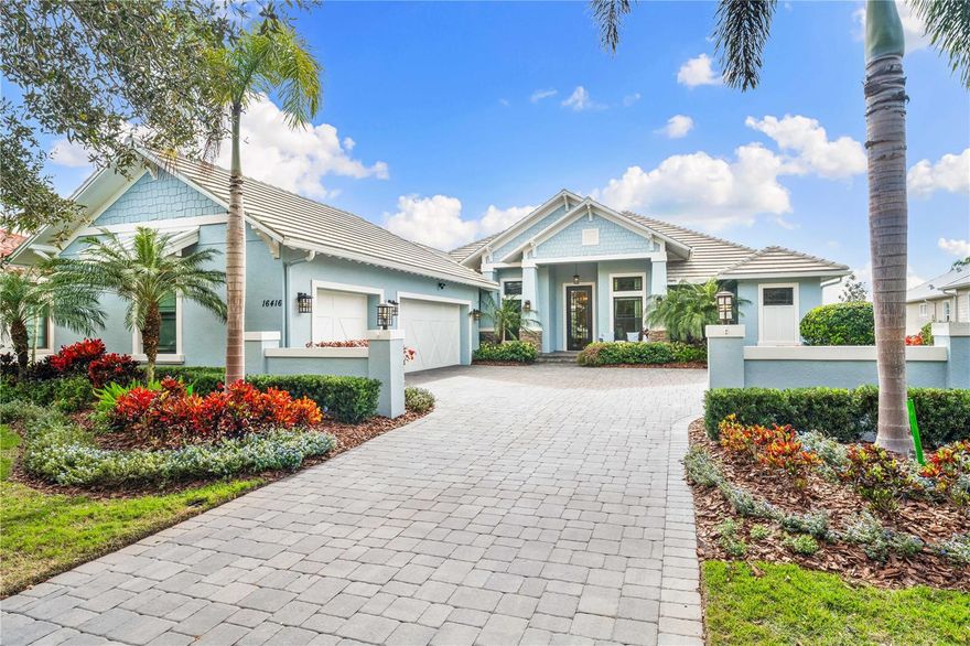 Live in casual elegance in this beautiful, professionally decorated coastal home located in the Vineyards in the highly sought after Lake Club community.  This exclusive home is ideally situated on a premier picturesque lake homesite with expansive water views.  As you enter the home, notice bright open living spaces with soaring ceilings, large impact windows & doors guiding your eyes to the tranquil backyard retreat.  At just over 4,000 sf, this home offers 3 bedrooms, four and half baths, a bonus room and office.  The centerpiece of the home is an impressive great room combining a large family room, gourmet-inspired kitchen, and dining room overlooking the lanai.  The kitchen offers a large marble center island, plenty of cabinets, pantry, glass tile backsplash, built-in stainless-steel appliances, 5-burner gas range and wine bar.  Designer details throughout the home include:  eight-inch base moldings, oversized crown molding, wide plank porcelain tile, designer light fixtures, custom window treatments, and beautiful wall and ceiling details.  The master bedroom wing has a large seating area, lanai access, walk-in closets, a bright and spacious bath including two vanities, a walk-in shower, and a large soaking tub.  The office is adjacent to the master suite just off the expansive foyer.  The spacious guest rooms are all en suites with generous walk-in closets.  Located off the main living area is a large bonus room (could be converted to 4th bedroom), with dry bar overlooking the lake.  Additional features include 3-car air conditioned garage, whole house 27K generator, Icynene spray foam insulation in garage, epoxy garage flooring, garage cabinetry and shelves, two large storage closets, security system, ring cameras, and so much more.  Residents can indulge in a plethora of activities, from the fitness center to tennis and pickle ball, or scenic kayak and walking trails, special dining and social events and activities.  The Lake Club offers satisfying amenities in this private and richly landscaped gated community.