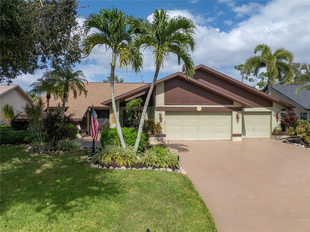 Photo of 7121 Twin Eagle Lane, Fort Myers, FL 33912 (MLS # C7532705)