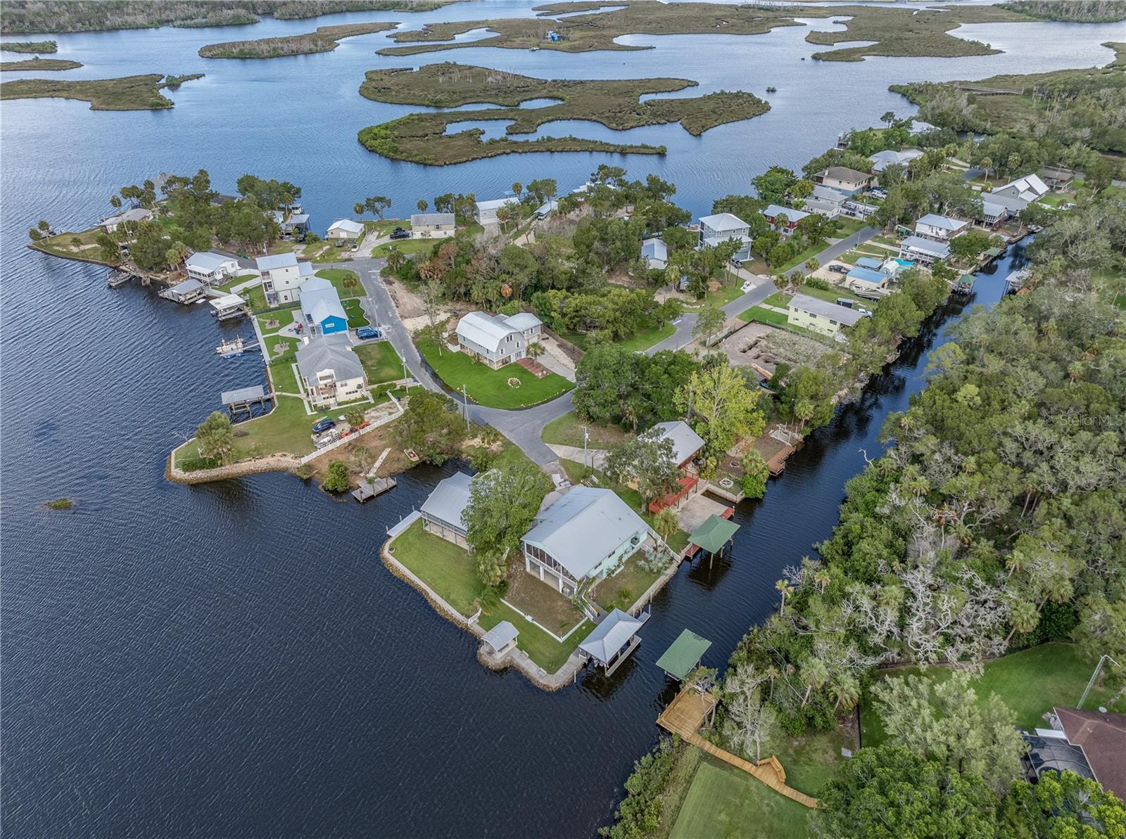 Charming Elevated Waterfront Home in Homosassa Enjoy water views from this solid, single-family home situated on the scenic waterways of Homosassa. This residence features a cozy gas fireplace, a convenient boat lift, seawall, and a cozy design that is light and bright. Perfect as a vacation rental or a permanent residence, it provides excellent fishing opportunities and a peaceful, private retreat. Whether you're relaxing by the water or hosting guests on the huge deck out back , this house allows for vacation rental opportunities, has durability, and great for outdoor adventure. Close to all the local favorite restaurants, Shrimp docks, and wild life in the immediate area.