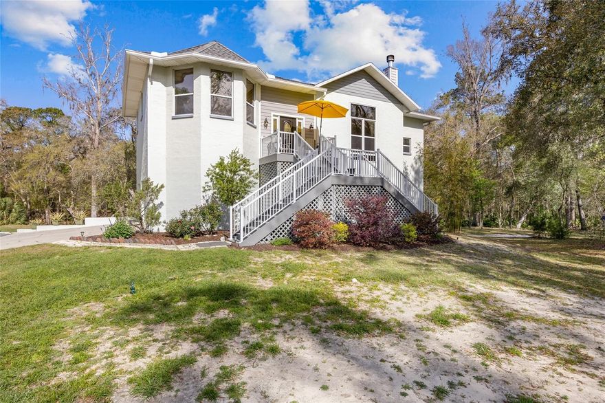 Nestled on more than 10 acres of serene riverfront land, this stunning property offers unparalleled natural beauty, privacy, and recreation. With a private dock on the Suwannee River, you’ll enjoy peaceful water views, abundant wildlife, and the gentle sounds of nature right from your doorstep. Located right next to two boat ramps and near Ginnie Springs. This property is a dream for boating, fishing, and spring lovers alike. Recent updates include a new roof, new septic system, and updated hot water heater. This all block home offers just over 2,900 square feet of living space, featuring 3 bedrooms, 2.5 baths, a spacious laundry room, a large storage room, a two-car garage, and an updated kitchen with plenty of storage. Inside, you’ll also find high ceilings in the main living area and large windows with river views. An elevation certificate is already in place for added peace of mind. Enjoy abundant wildlife, spacious land, and the perfect blend of comfort and tranquility in this riverfront retreat. Whether you’re relaxing by the river on your private dock, exploring the outdoors, or hosting family and friends, this private retreat blends comfort with endless recreation. With its tranquil setting, modern upgrades, and unbeatable location right on the Suwannee River, this property is the ultimate sanctuary.