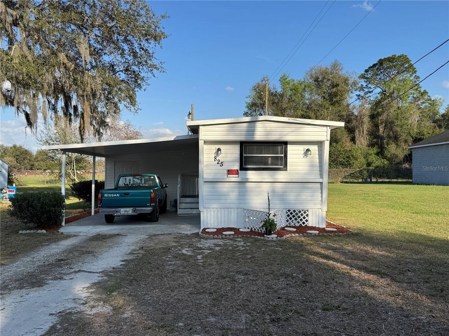 Charming and remodeled two-bedroom, one-bath mobile home offering 612 square feet of comfortable living space. Built in 1966 and set on nearly a quarter-acre lot, this home provides a great opportunity as a rental investment or a permanent residence. The open-concept family room and kitchen create a welcoming layout, and the convenience of indoor laundry adds to the home’s functionality. Part of the carport has been enclosed and remodeled to create a versatile den or guest room. A storage shed in the backyard offers plenty of extra space for tools, hobbies, or seasonal items.