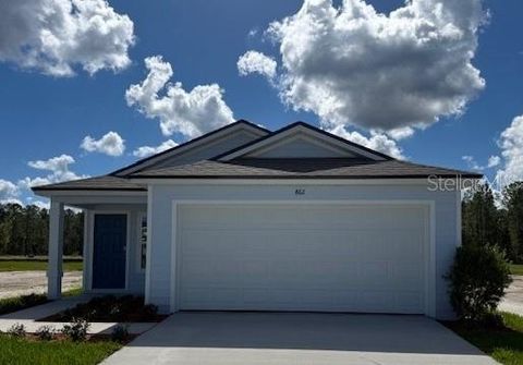 Photo of 862 Grand Reserve Drive, Bunnell, FL 32110 (MLS # FC313010) Photo of 862 Grand Reserve Drive, Bunnell, FL 32110 (MLS # FC313010)