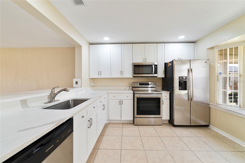 Photo of 12344 Shady Spring Way #106, Orlando, FL 32828 (MLS # O6384313)