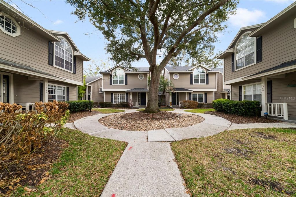 Photo of 12344 Shady Spring Way #106, Orlando, FL 32828 (MLS # O6384313)