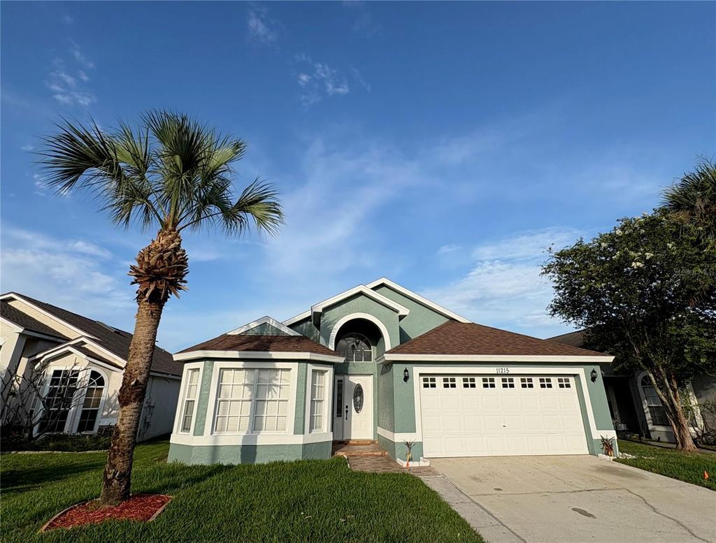 Photo of 11215 Crystal Glen Boulevard, Orlando, FL 32837 (MLS # O6420510)