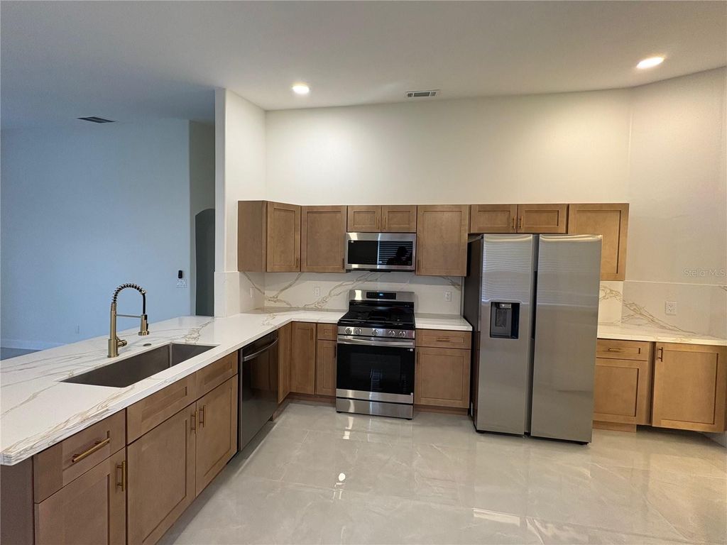 Photo of 11215 Crystal Glen Boulevard, Orlando, FL 32837 (MLS # O6420510)