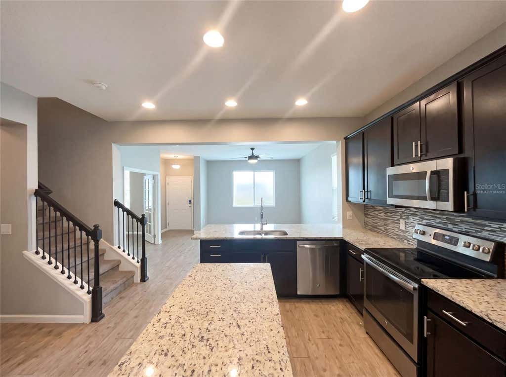 Photo of 2264 Ficus Alley, Apopka, FL 32703 (MLS # O6423700)