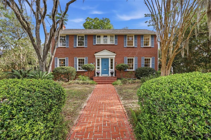 Step into timeless character and unbeatable location with this two-story vintage brick traditional home, proudly showcasing a Heritage Marker reading “Dr. Harry Merchant Family 1938.” Just seven blocks from UF, you can enjoy an easy walk to campus while skipping the hassle and cost of parking.
A welcoming foyer opens to a spacious living room filled with natural light, featuring a wood-burning fireplace and access to a charming sunroom. The remodeled kitchen flows seamlessly into a large dining room, perfect for entertaining or everyday living.
Out back, you’ll find a private yard and a two-car garage accessed via a rear neighborhood lane. The garage currently houses the washer and dryer, with additional hookups available for a stackable unit in the convenient first-floor half bath near the office.
Upstairs, all three bedrooms offer impressive space. The primary suite features a second fireplace for those enchanting evenings plus an adjacent sunroom—an ideal spot to unwind and take in peaceful views. Additional highlights include two HVAC systems replaced in 2020, a garage roof updated in 2021, and a basement space accessible from the foyer—perfect for storage or even a future wine cellar.
A rare blend of historic charm, modern updates, and prime location—this home is truly one of a kind.