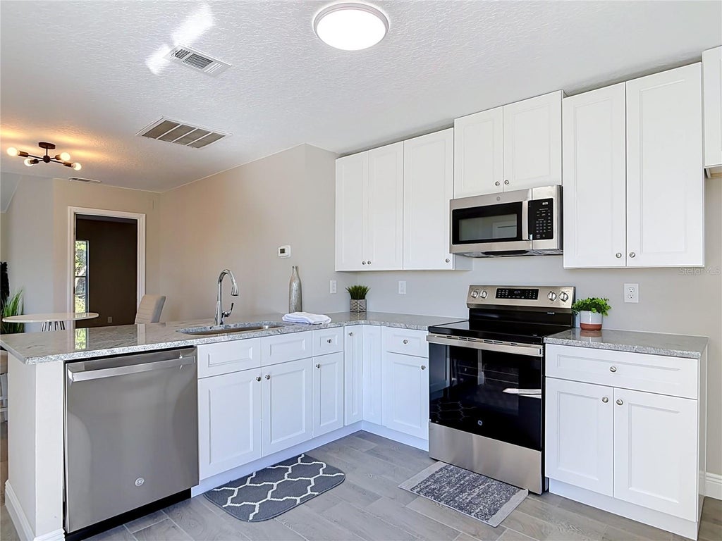 Photo of 3025 Foxboro Circle, Deltona, FL 32738 (MLS # O6448179)