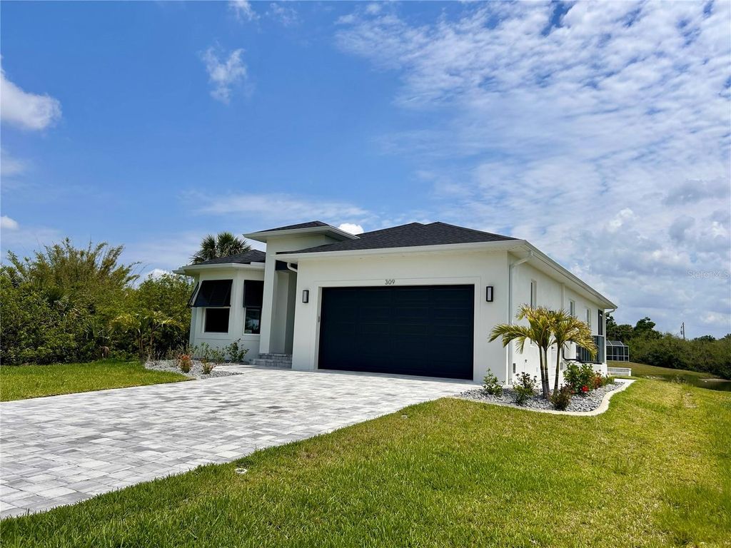 Photo of 309 Sunset Road, Rotonda West, FL 33947 (MLS # A4685321)