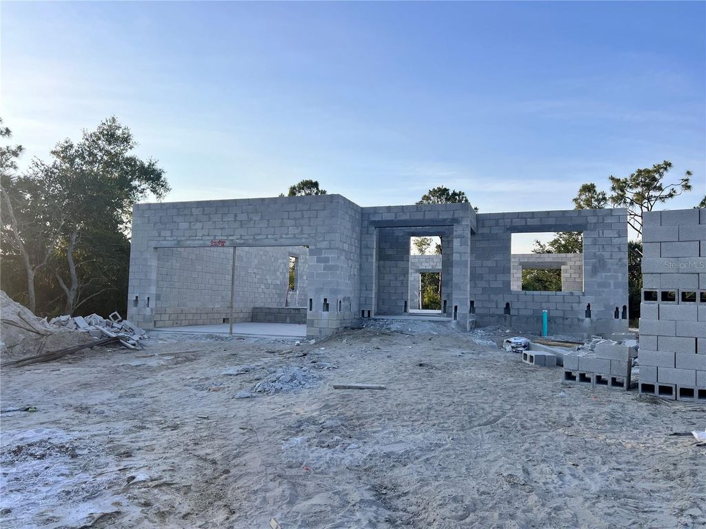 Photo of 122 Naomi Pl, Rotonda West, FL 33947 (MLS # S5127651)