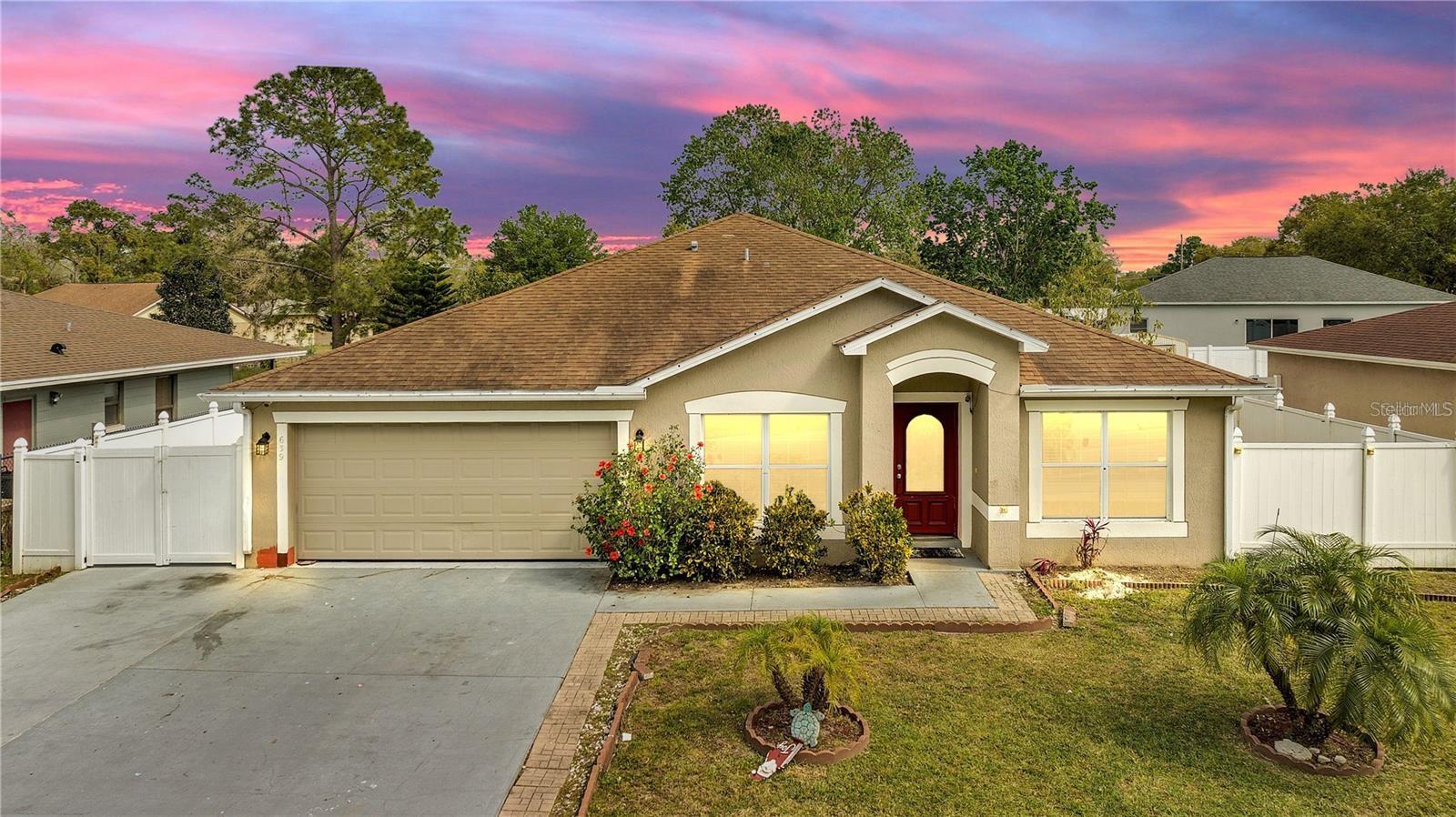 Welcome to this 3-bedroom, 2-bathroom house that features just over 2k square feet. Spacious, with a large backyard complete with a sink and bar. The master bath has a garden tub, the kitchen comes with stainless steel appliances, vaulted ceilings throughout the house, fenced with an additional large shed. The home has an open concept perfect for family gatherings, located minutes from shops and short-term rentals allowed, making it the perfect primary, vacation, or investment home. This property is near major attractions, hospitals, and schools. The community has a pool, gym, basketball court, ladies' club, parks, and community events. Come check out all the possibilities! Purchase rates may be available through our preferred lender. A great way to step into your next home!