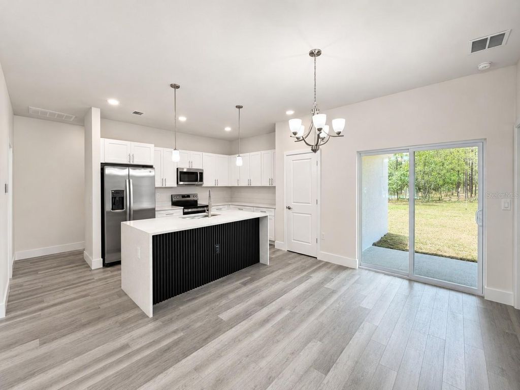 Photo of 23163 SW Pony Ridge Drive, Dunnellon, FL 34431 (MLS # O6425465)